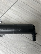 Spryskiwacz reflektora VW 5NA955104A siłownik dyszy NOWY