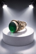 Srebrny pierścień kopuła, pierścionek z zielonym oczkiem