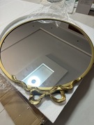 lustro ścienne w stylu vintage z ozdobną kokardą