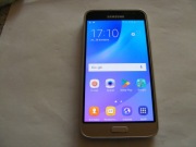Ładny smartfon samsung galaxy j3 6 złoty z ładowarką nieoryginalną.