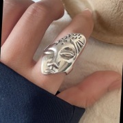 Srebrny pierścionek teatralna maska regulowany 925
