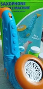 AUTOMATYCZNA WYTWORNICA DO BANIEK MYDLANYCH DLA DZIECI  SAKSOFON Z PASKIEM 