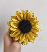 Gumki albo spinki do włosów. Słonecznik.