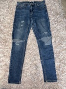 Spodnie skiny z dziurami Sinsay rozmiar 38