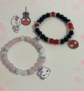 Bransoletki dla par hello kitty x spiderman sanrio