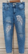 Spodnie jeansy ze skrzydłami rm. M