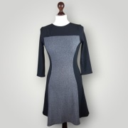 Elegancka sukienka H&M 36 – czarno-szara, wygodna i elastyczna