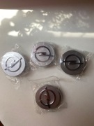 Dekielki na felgi i alufelgi 59 mm do OPEL ASTRA J / ASTRA H / CORSA D