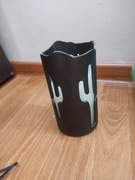 Świeca w metalowej obudowie