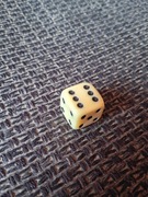 Ecru - kostka do gry 