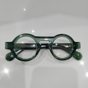 Piękne dizsjnerskie okulary w kolorze butelkowej zieleni, szkła 0