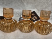 Trzy świeczniki na świece stołowe pomarańczowe 