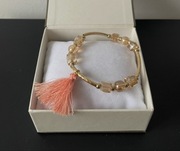 Złota bransoletka z zawieszką frędzle