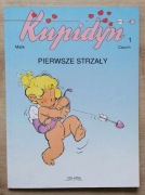 Kupidyn 1 Pierwsze strzały Malik, Cauvin