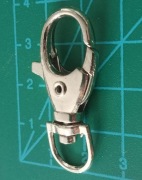 KARABIŃCZYK METAL SREBRNY NIKIEL DO TOREBEK PASKÓW BRELOK 1 SZT