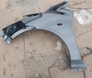 Błotnik lewy Mazda 2