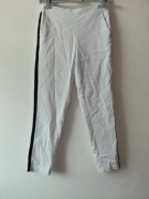 Spodnie białe z czarnymi lampasami roz.M wymiary opis firmy Infiniti 