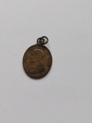 Stary medalik mosiężny