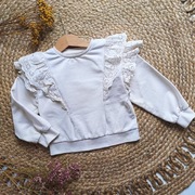 Bluza z falbankami 98 koronkowymi falbanki beżowa ecru elegancka falbany ko