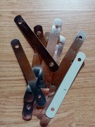 Metalowe nakładki na wąsy skoroszytowe - 18 sztuk.