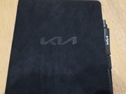 Notes marki Kia w linie z długopisem