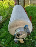 Ogrzewacz wody elektryczny / piec opalany paliwem stałym