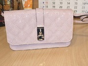 Mam na sprzedaż jak nową Torebko-portfel oryginał Guess 