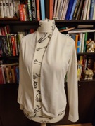 Białe wdzianko marki Reserved