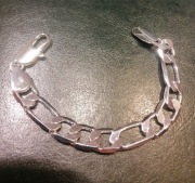 Bransoleta splot figaro pokryta srebrem próba 925 szer 12mm waga 24g dł 20c