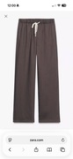 Zara brązowe czekoladowe spodnie w prążki luźne 