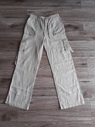 Lniane długie spodnie damskie rozmiar S beżowe proste nogawki na lato 