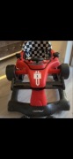 Interaktywny Chodzik jeździk pchacz Wyścigówka Formuła 1 3w1 czerwony