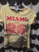 Nowa koszulka z uszkodzeniem na szwie