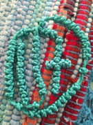 Różaniec ze sznurka satynowego pleciony kolor pastelowy szmaragdowy