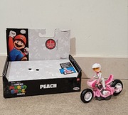 Laleczka Peach Super Mario Movie figurka motorze z napędem pull back JAKKs