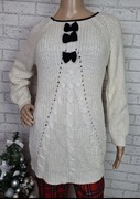 Świąteczny kremowy beżowy sweter tunika kokardki ciepły elegancki S M