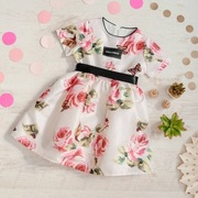 Elegancka sukienka dziewczęca w kwiaty R. 116–122 cm