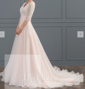 Suknia ślubna z organzy i kor. w kol. szampański.