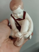 Stara porcelana chłopiec 