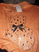 Sweter z srebrnym misiem