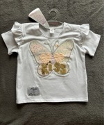 Bluzeczka z cekinowym motylem r. 104