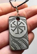 Trawiony amulet słowiański