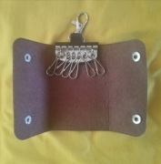 skórzane etui na klucze klasyczne brązowe jak nowe na 6 kluczy