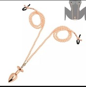 Korek analny z łańcuszkiem i zaciskami na sutki