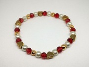 Bransoletka damska z perełkami i serduszkami