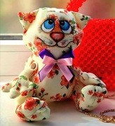 Beżowy kot z niebieskimi oczami 