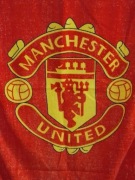  Ręcznik klubu piłki nożnej Manchester United okres AIG 2006-2010 używany.Y