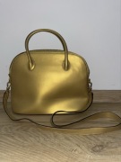 Złota torebka Celine