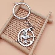 Brelok The Hunger Games Kosogłos Mockingjay symbol rebelii Igrzyska Śmierci