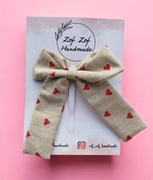 Elegancka duża kokarda w serduszka